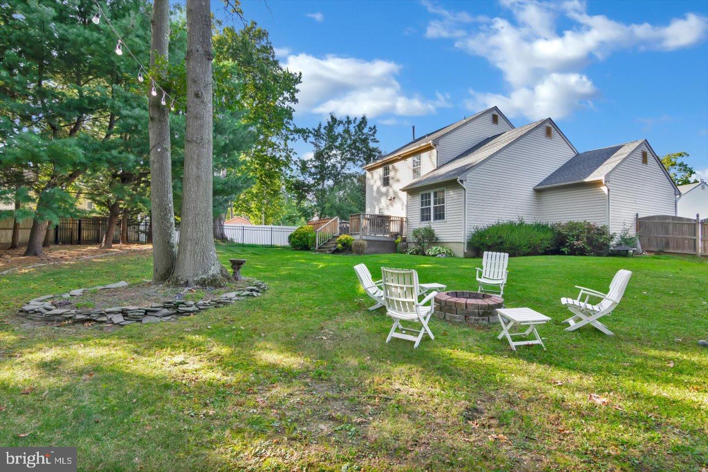 388 Sapling Way Atco, NJ 08004 - Photo 47 of 49 a view of a house with backyard sitting area and garden