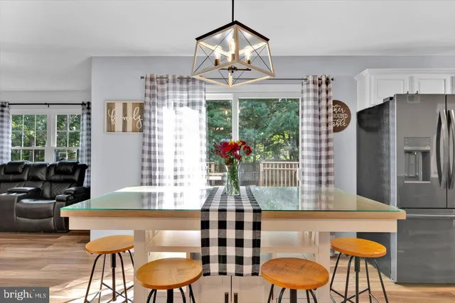 a table and chairs in a kitchen