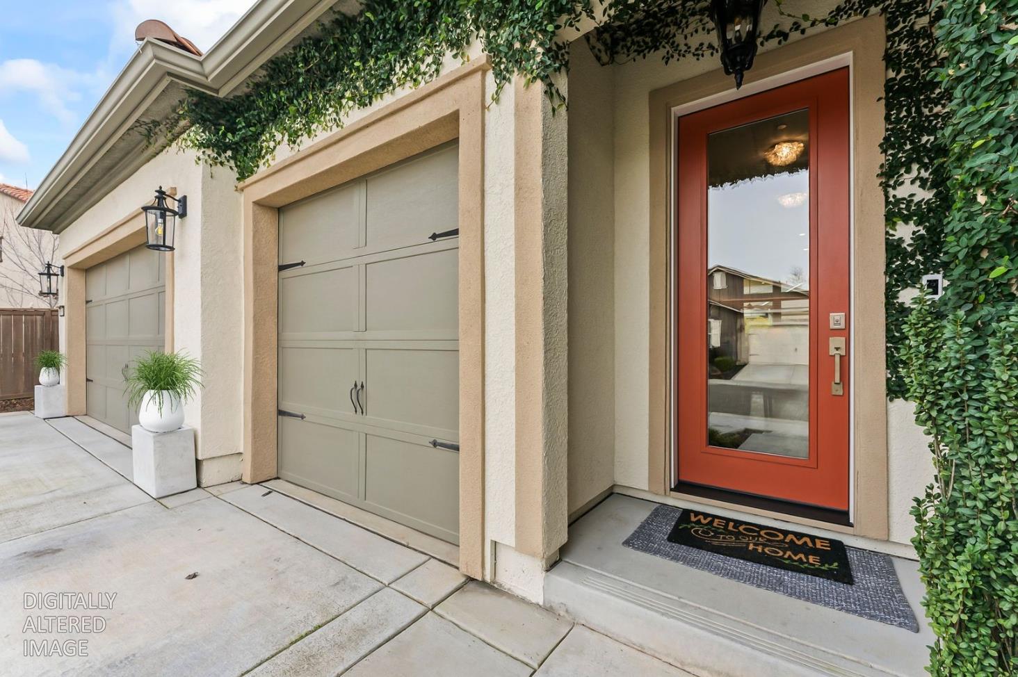 1509 Harvest Loop Folsom, CA 95630 - Photo 25 of 92 THIS STATELY RESIDENCE has so much architectural appeal, charming, feels warm and inviting. This home is not a blank slate, it has a personality, the devil is in the details. Numerous upgrades, the seller has spared no expense. The limestone look embellishment on the front facade, gives the house the Italian townhouse feel. Clean crisp tailored lines, well defined concepts and design make this a stand out. The following photo study is worth of the best home magazine. Please schedule your tour today, before this one gets away! The stunning 8 foot tall glass French door invites you in!