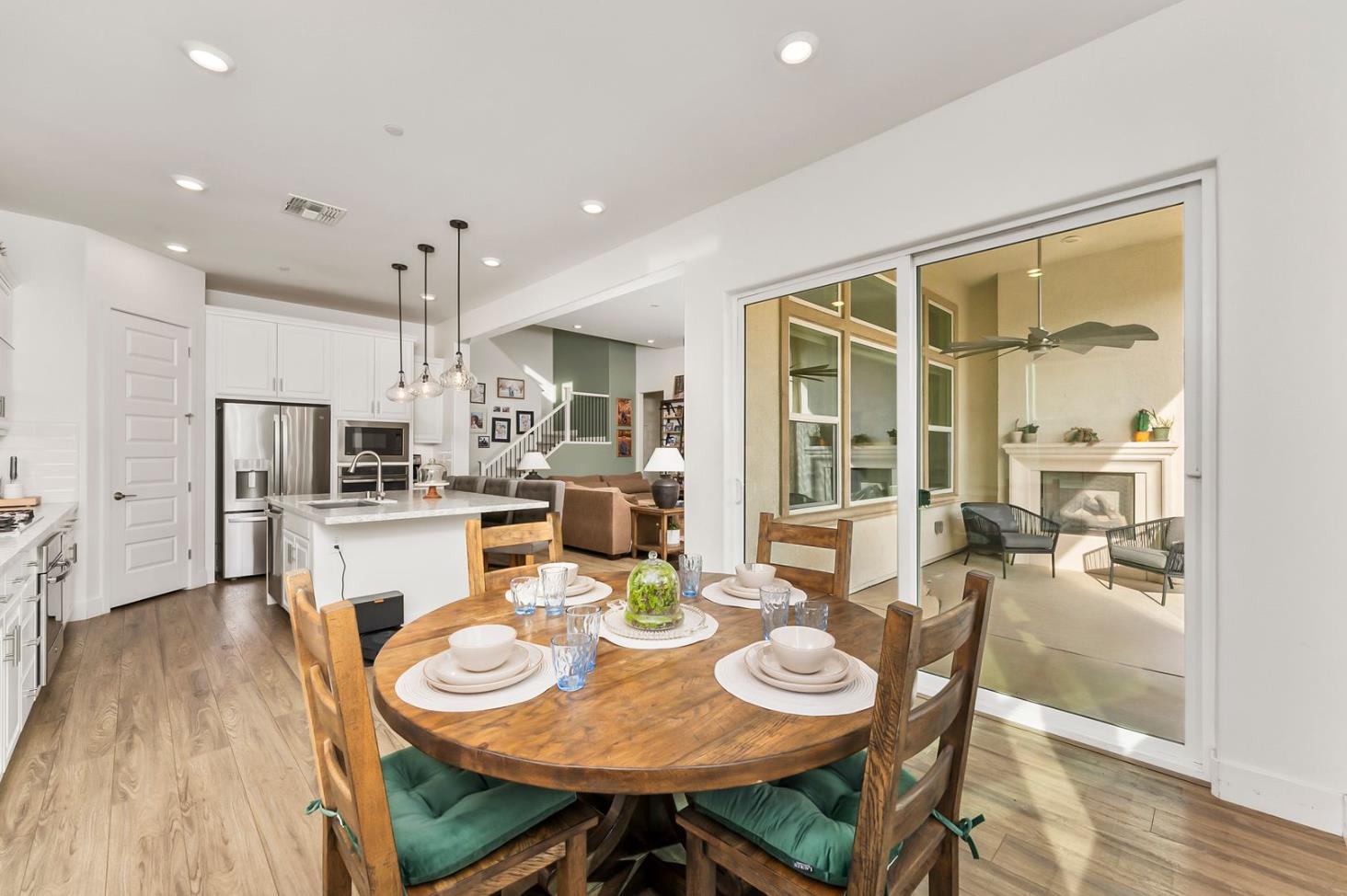 1509 Harvest Loop Folsom, CA 95630 - Photo 39 of 92 IN THE TRADITION OF HARMONIOUS DESIGN, THE GOURMET CHEF KITCHEN meets three criteria, it is magnificent, comfortable and super functional. The height of design, this kitchen meets all three criteria beautifully. The emphasis might appear to be more on form trumps function, when in reality is it the epitome of form follows function! But do not be deceived, this picture perfect kitchen is deceptively hard working. With the extended cabinetry into the breakfast room, to the upgraded designer stainless steel appliances and sleek and sophisticated quartz slab counters. This kitchen is elegant with casual comfort -- creating an environment that will surely be a favorite gathering spot for generations. Please do not miss the large walk in doored pantry!