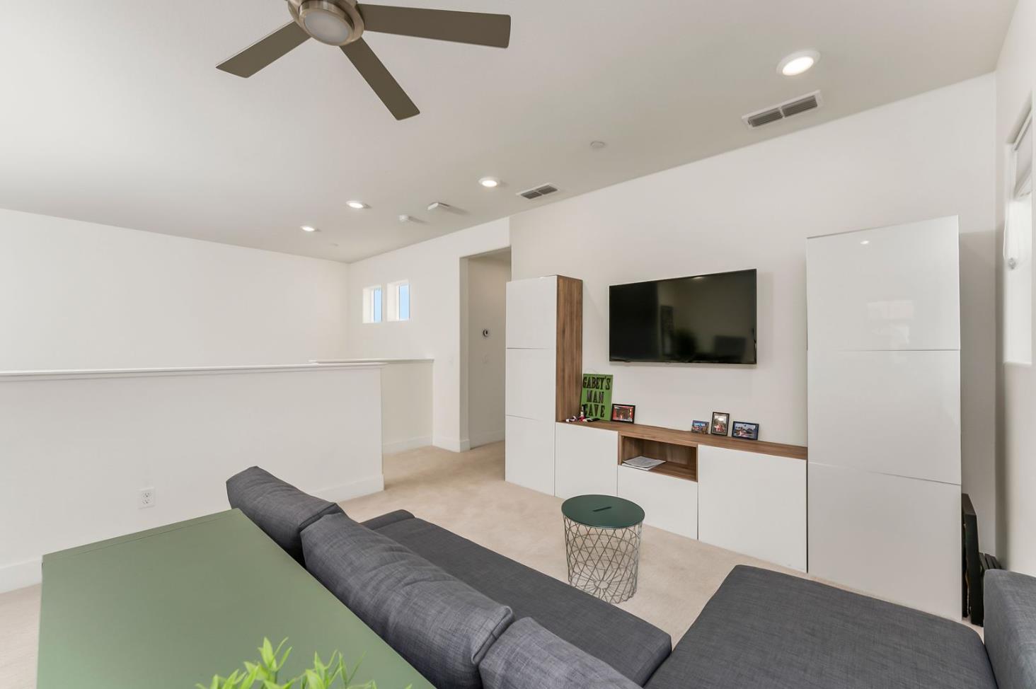 1509 Harvest Loop Folsom, CA 95630 - Photo 44 of 92 THE THIRD BEDROOM ENSUITE LOFT, large and roomy, seen here with a entertainment and office setup.