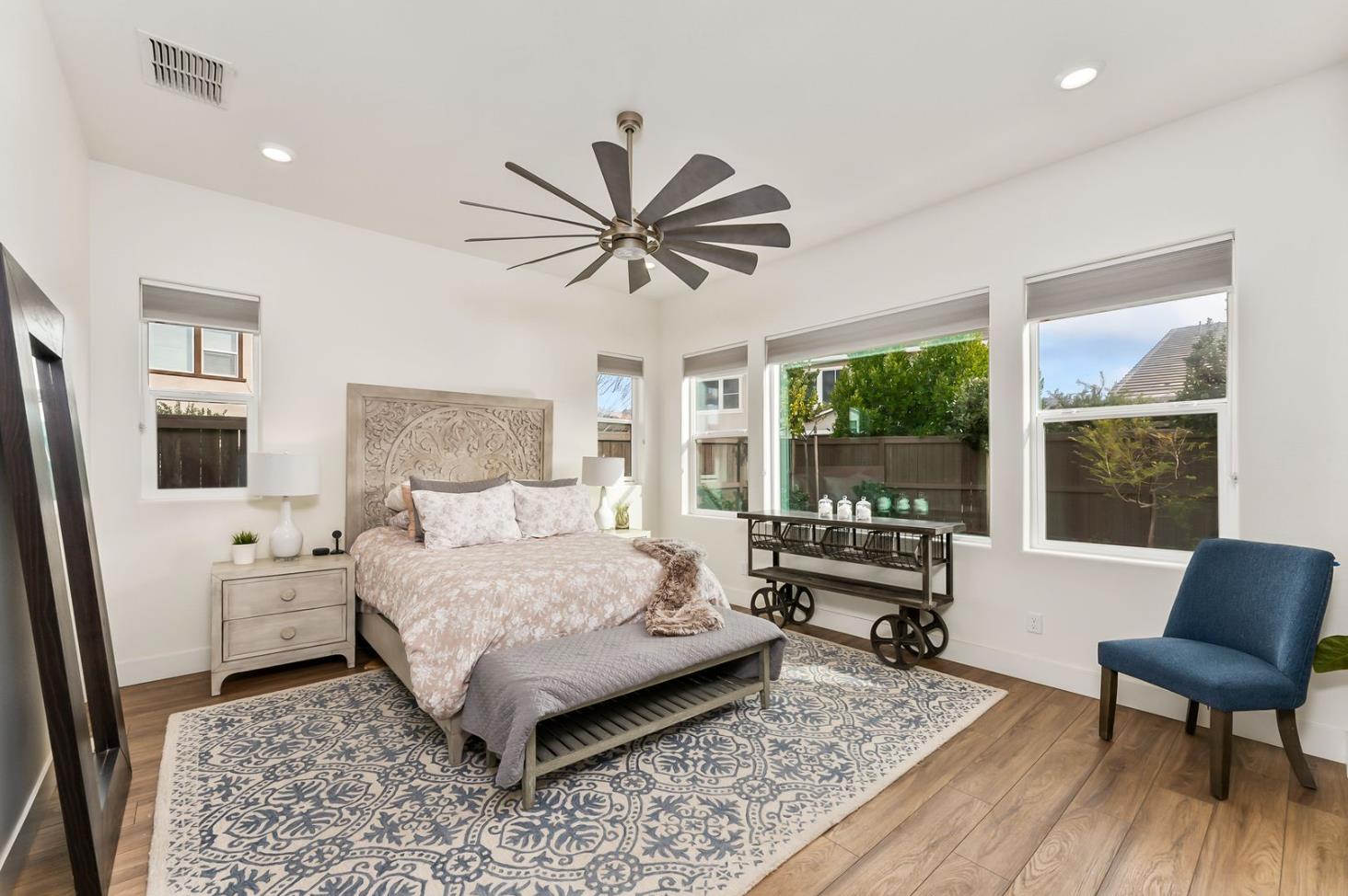 1509 Harvest Loop Folsom, CA 95630 - Photo 50 of 92 THE PRIMARY ENSUITE is only rivaled by it Junior Primary Ensuite. What they both have in common, they are both on the ground floor. That is almost impossible to find! No more stairs just to go to bed, lol. It's true, hard to appreciate until you have it, and sorely missed when you do not. Flood with natural light, and overlooking the rear yards and gardens of the lanai.