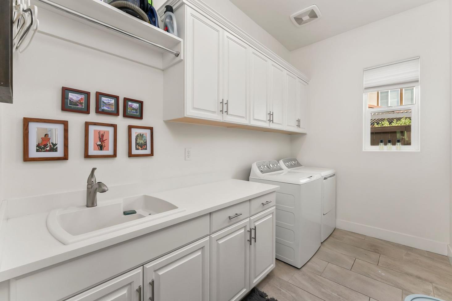 1509 Harvest Loop Folsom, CA 95630 - Photo 61 of 92 OVERSIZED LAUNDRY ROOM WITH SINK AND CABINETS!