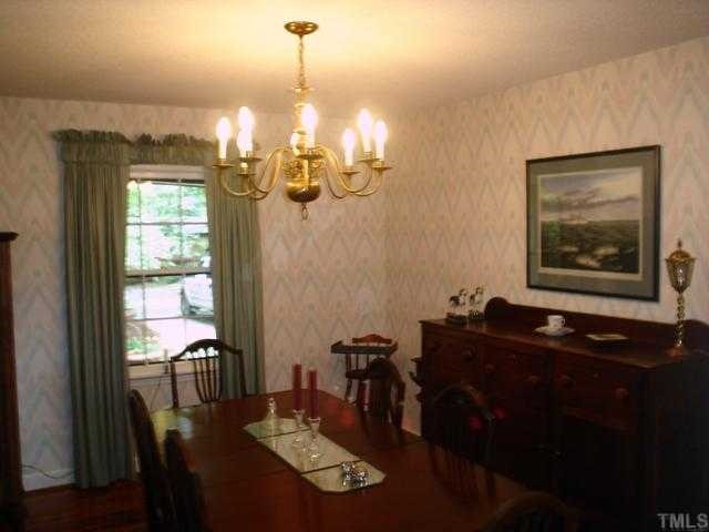 Large dining room opens to living room and kitchen. Gorgeous heart pine floor. Dining Room