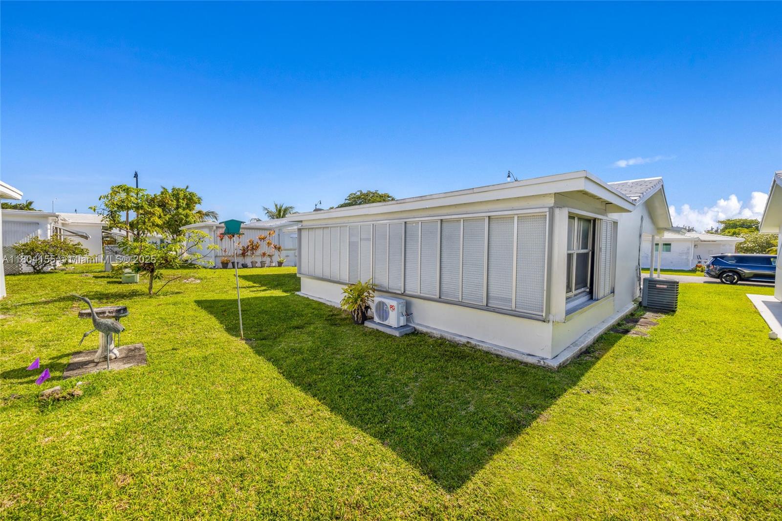 2520 Northwest 2nd Drive Pompano Beach, FL 33064 - Photo 20 of 20 a view of a house with backyard