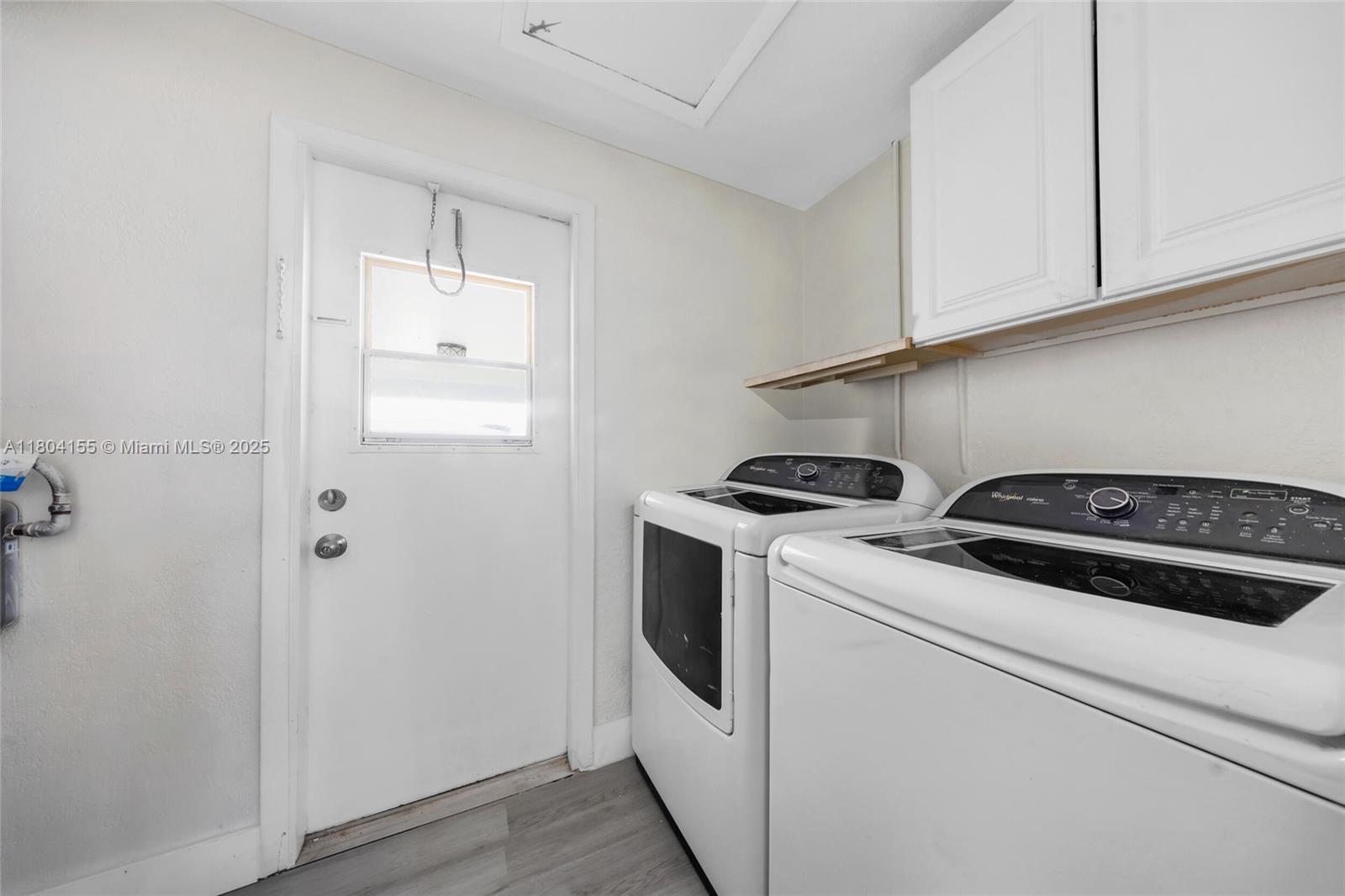 2520 Northwest 2nd Drive Pompano Beach, FL 33064 - Photo 10 of 20 a utility room with dryer and washer