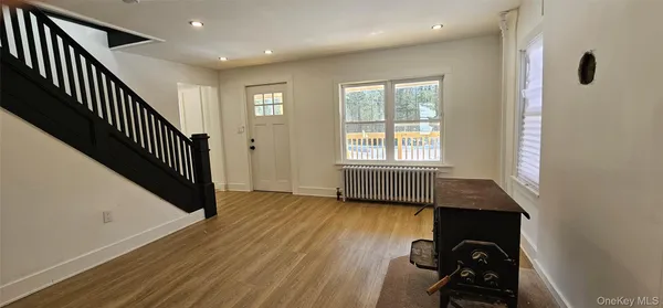 a view of an entryway with staircase