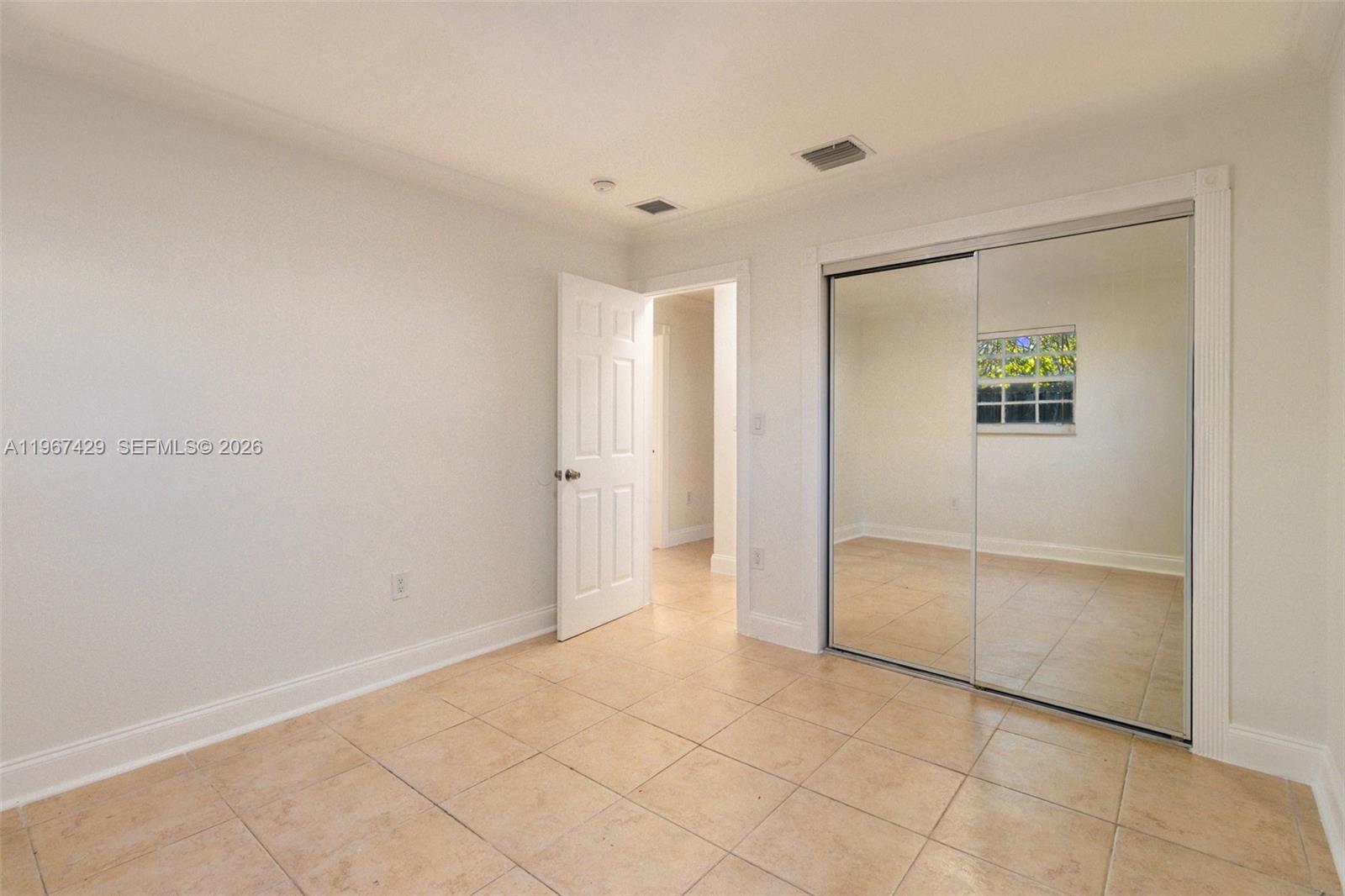 1518 Northwest 65th Street Miami, FL 33147 - Photo 17 of 28 a view of an empty room
