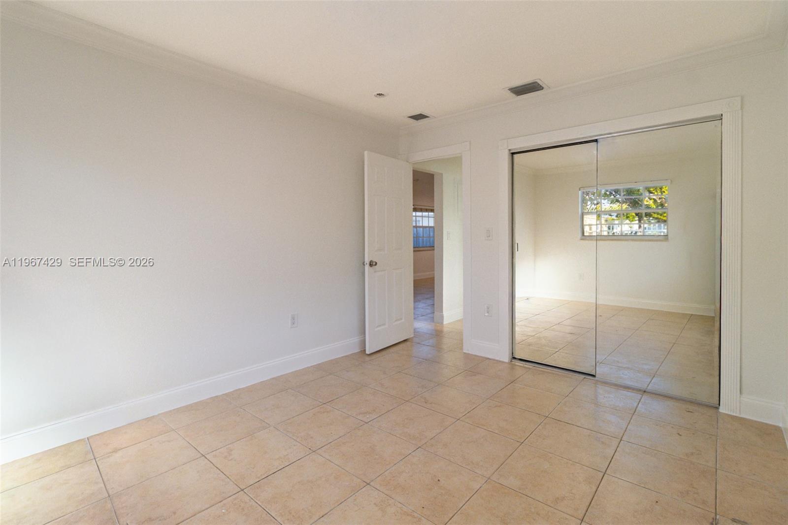 1518 Northwest 65th Street Miami, FL 33147 - Photo 18 of 28 a view of an empty room