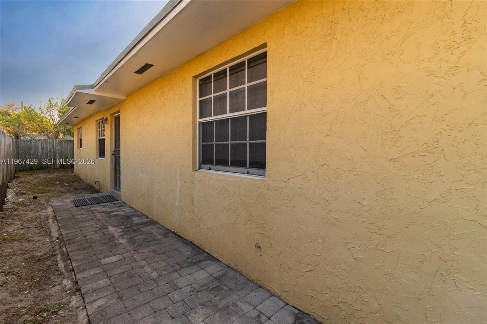 1518 Northwest 65th Street Miami, FL 33147 - Photo 24 of 28 a view of a house with a window