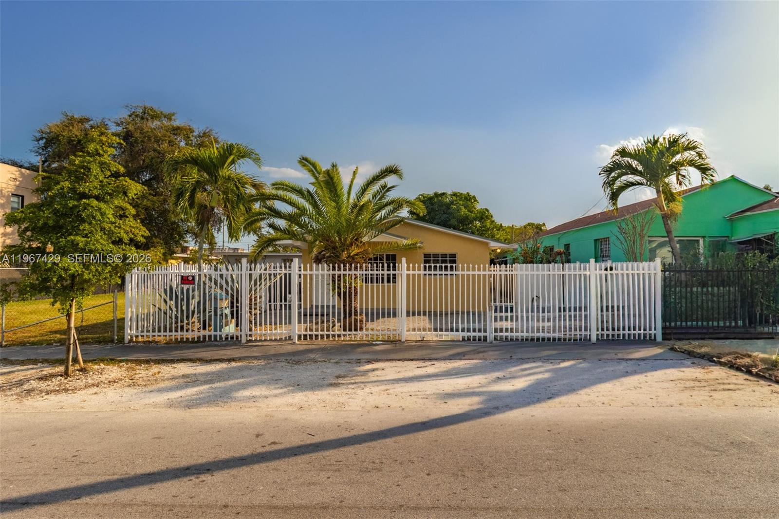1518 Northwest 65th Street Miami, FL 33147 - Photo 3 of 28 a view of a entrance gate of a house
