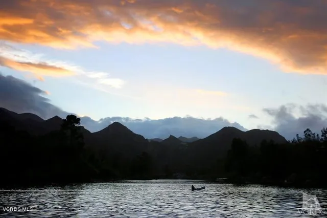 a view of a house with a mountain