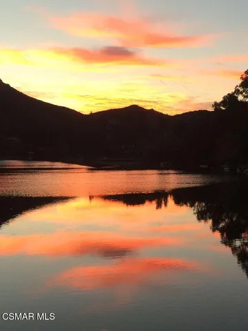 a view of lake with mountain