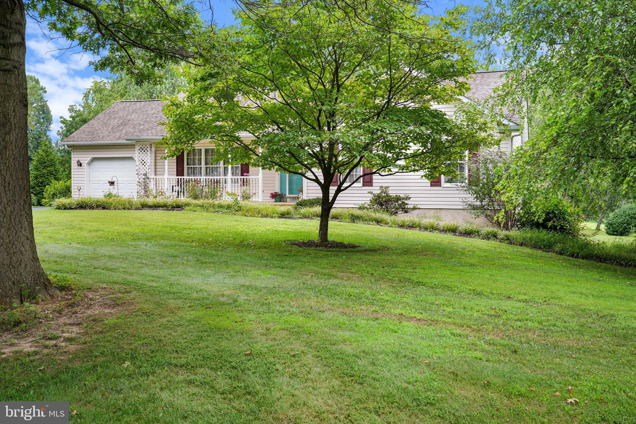 96 Country Side Loop Elkton, MD 21921 - Photo 8 of 40 a front view of a house with garden