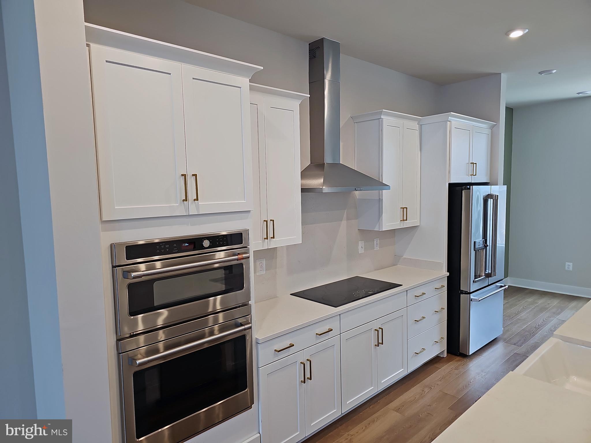 2333 Liberty Loop Herndon, VA 20171 - Photo 8 of 41 Gourmet kitchen with GE Cafe appliances. Top end