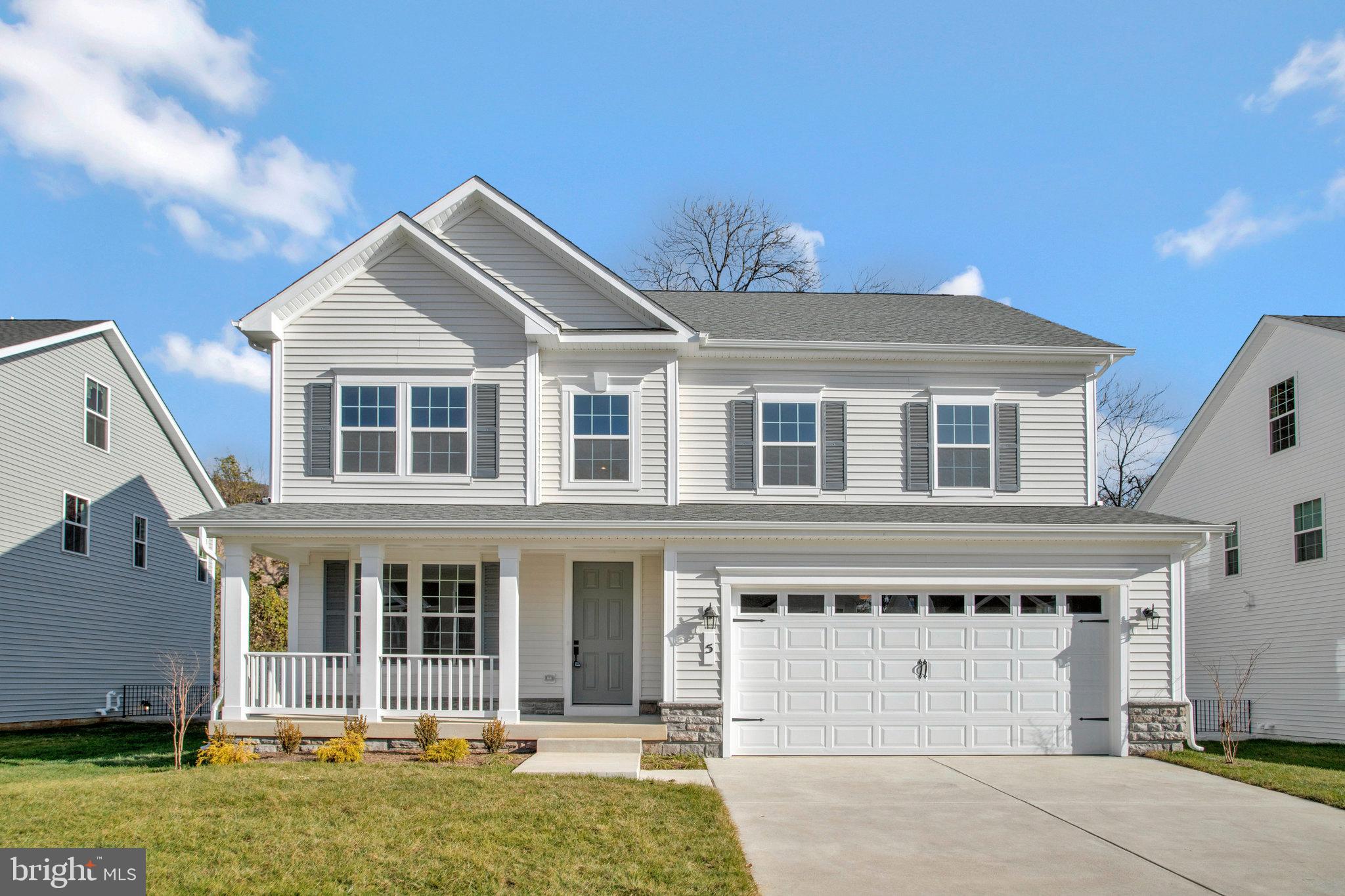 5 Brooks Nolen Way Owings Mills, MD 21117 - Photo 1 of 76 a front view of a house with a yard
