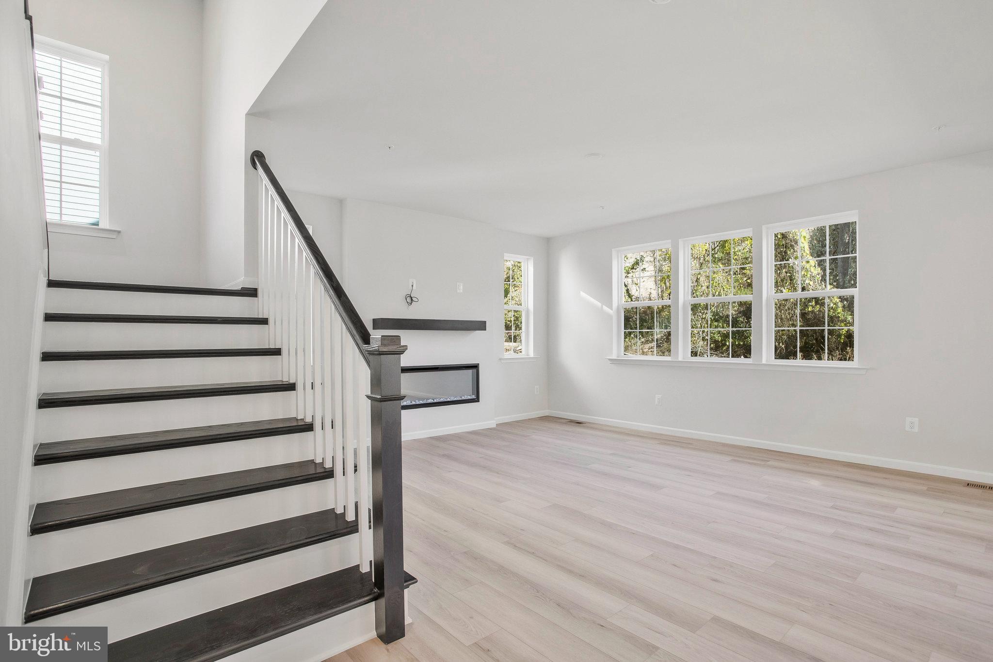 5 Brooks Nolen Way Owings Mills, MD 21117 - Photo 13 of 76 wooden floor in an empty room with a window