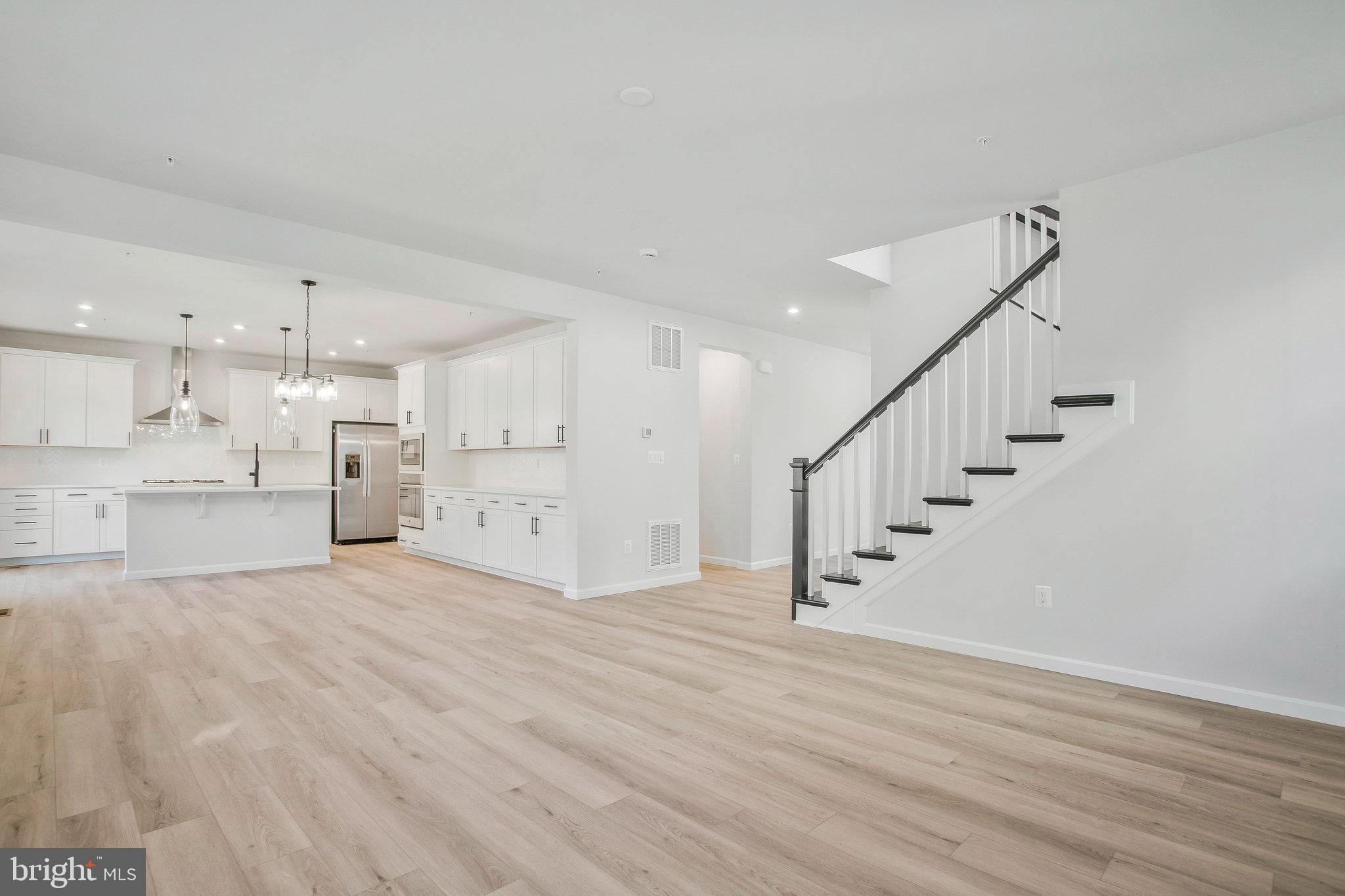 5 Brooks Nolen Way Owings Mills, MD 21117 - Photo 16 of 76 a view of an entryway with wooden floor