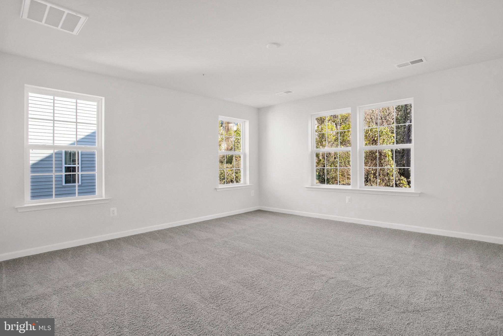 5 Brooks Nolen Way Owings Mills, MD 21117 - Photo 34 of 76 an empty room with windows