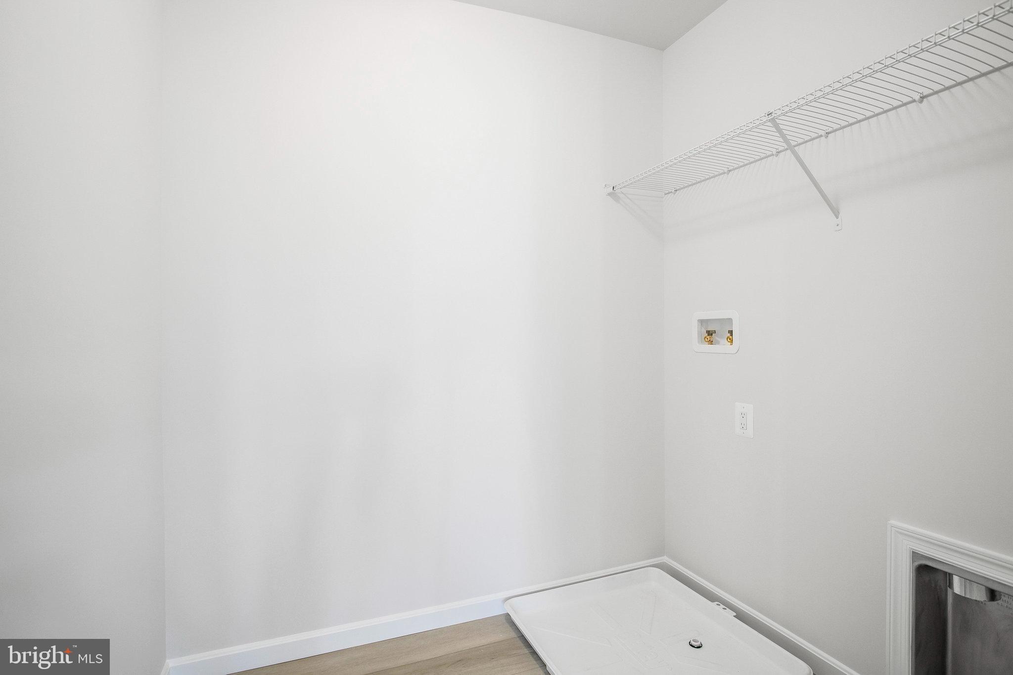5 Brooks Nolen Way Owings Mills, MD 21117 - Photo 45 of 76 a small space with a white wall