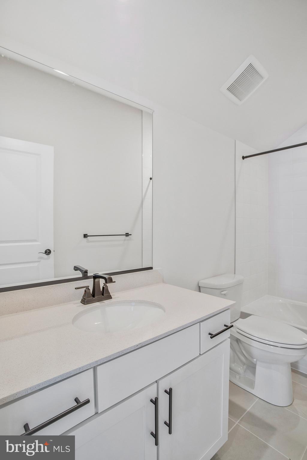 5 Brooks Nolen Way Owings Mills, MD 21117 - Photo 58 of 76 a bathroom with a sink and a toilet