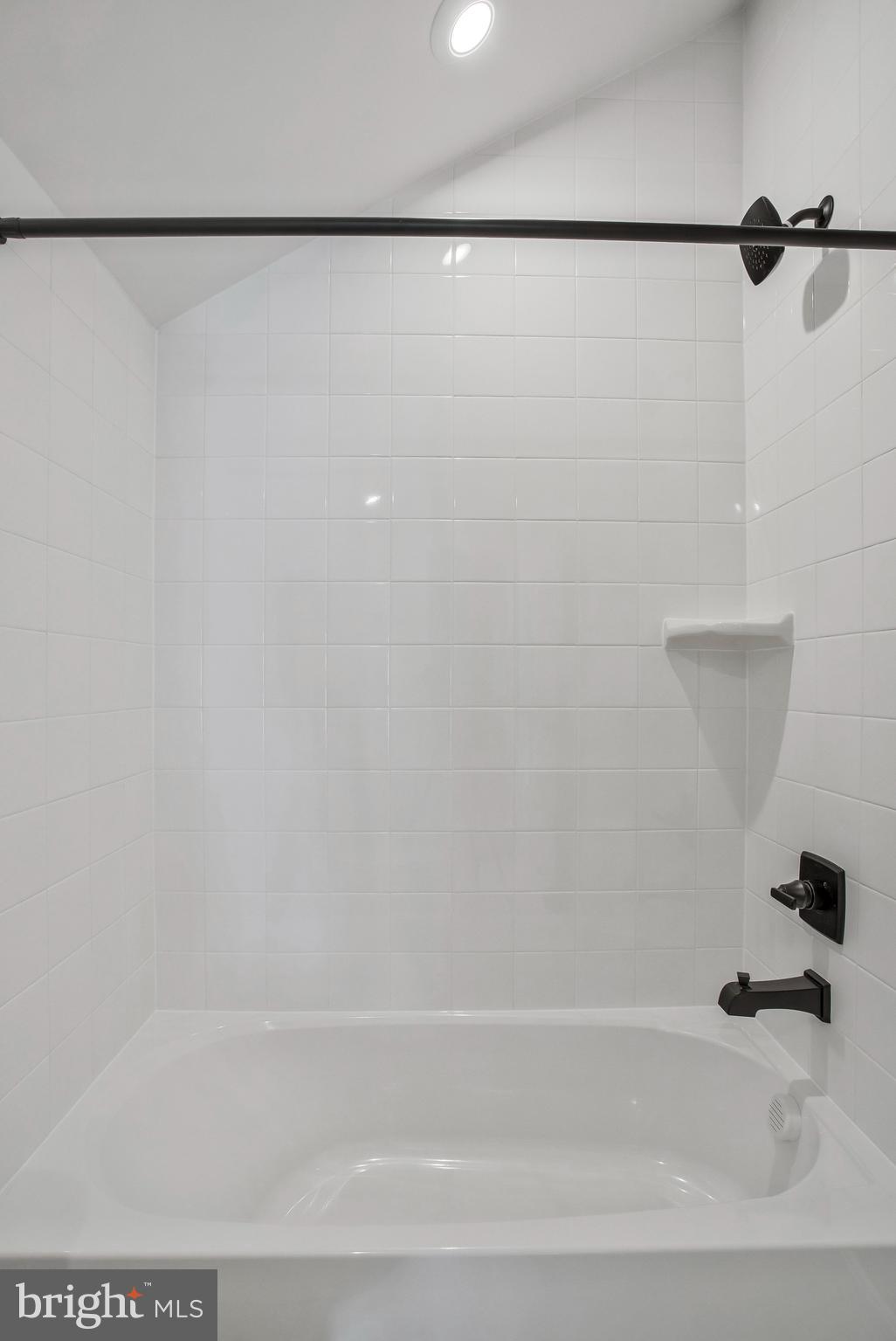 5 Brooks Nolen Way Owings Mills, MD 21117 - Photo 59 of 76 a bathroom with a bathtub