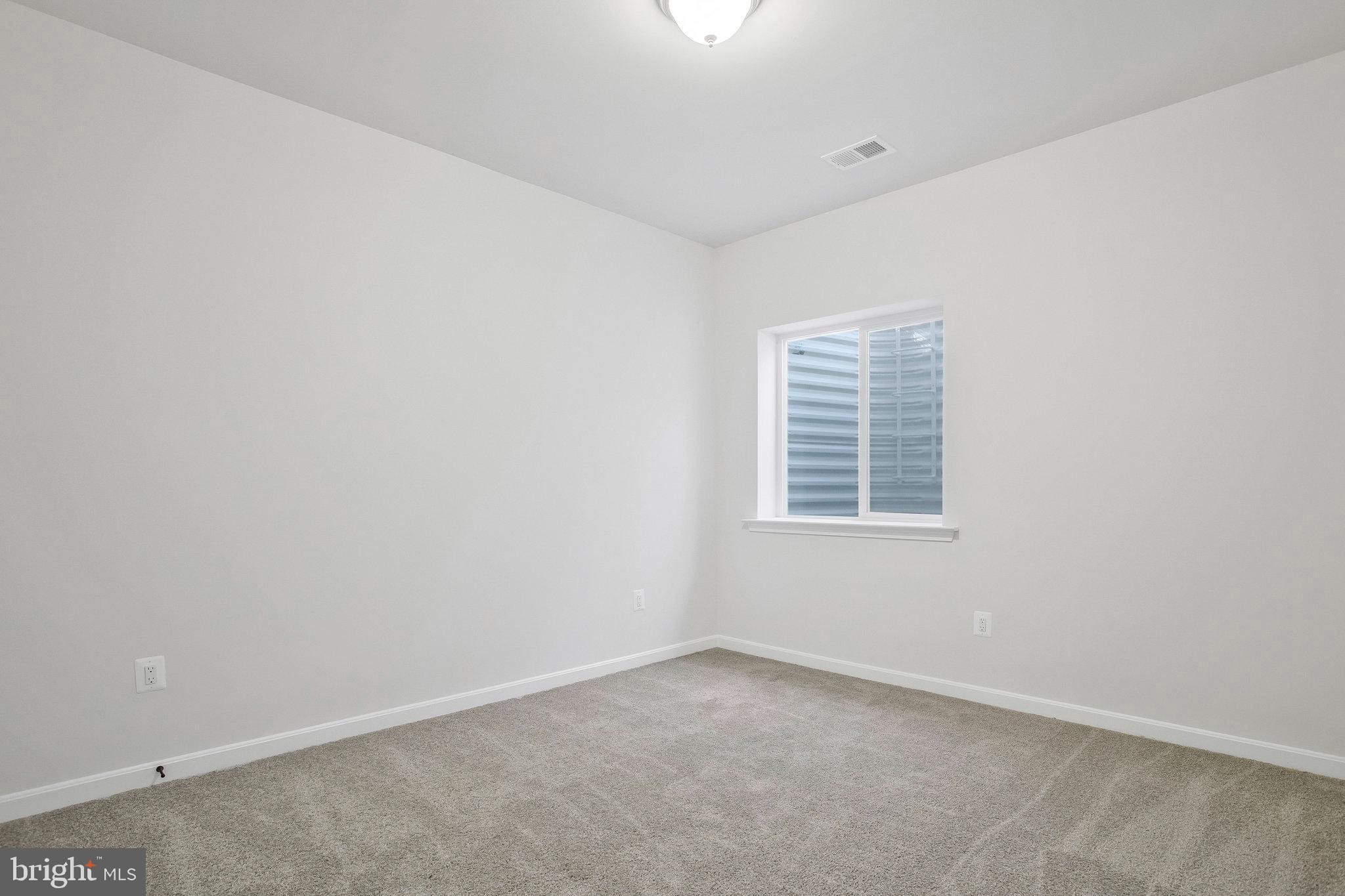 5 Brooks Nolen Way Owings Mills, MD 21117 - Photo 65 of 76 an empty room with a window