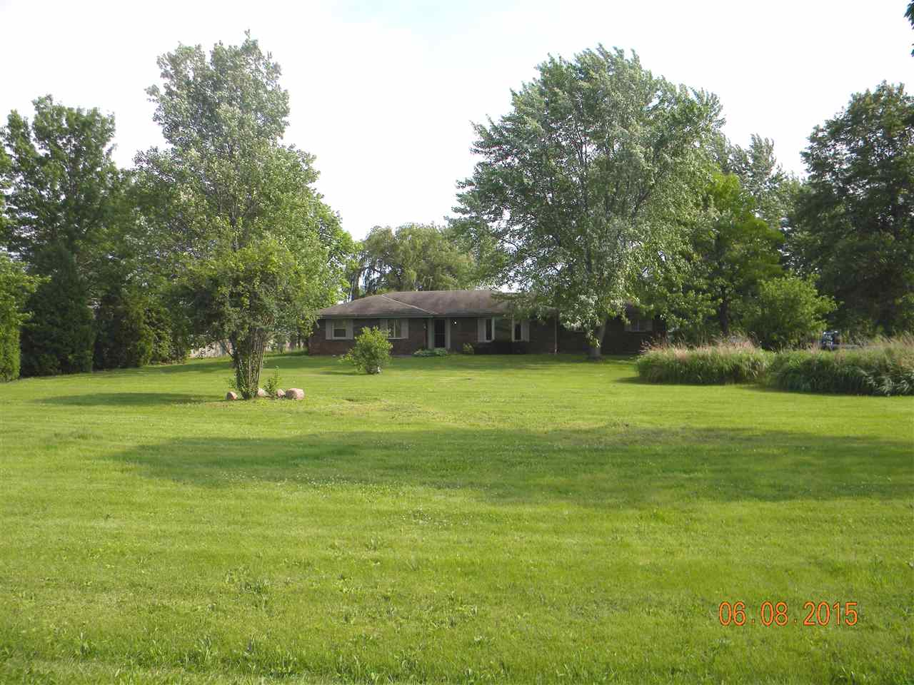 8105 Huber Road Belvidere, IL 61008 - Photo 1 of 20 a view of a house with a yard