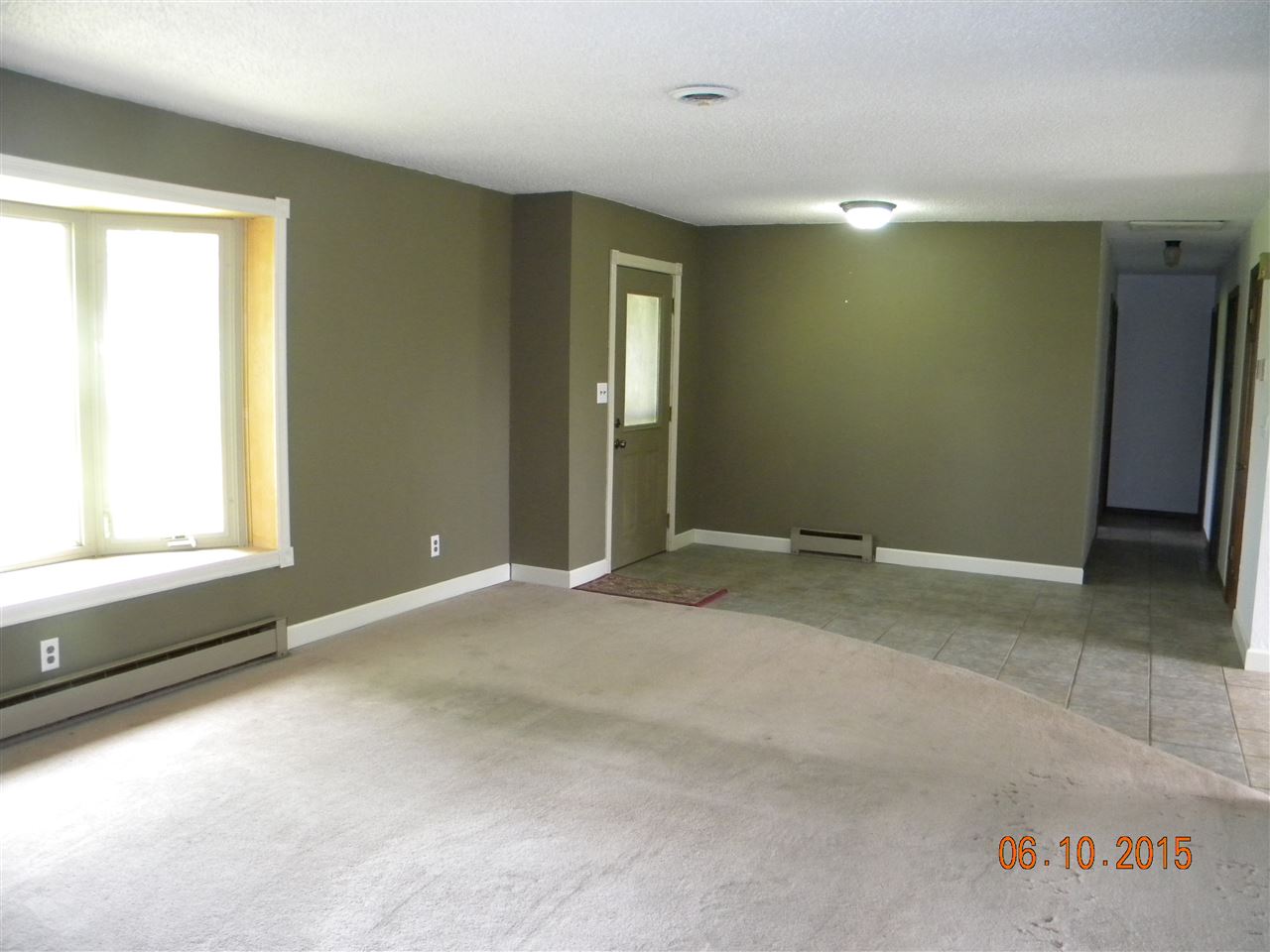 8105 Huber Road Belvidere, IL 61008 - Photo 6 of 20 an empty room with windows
