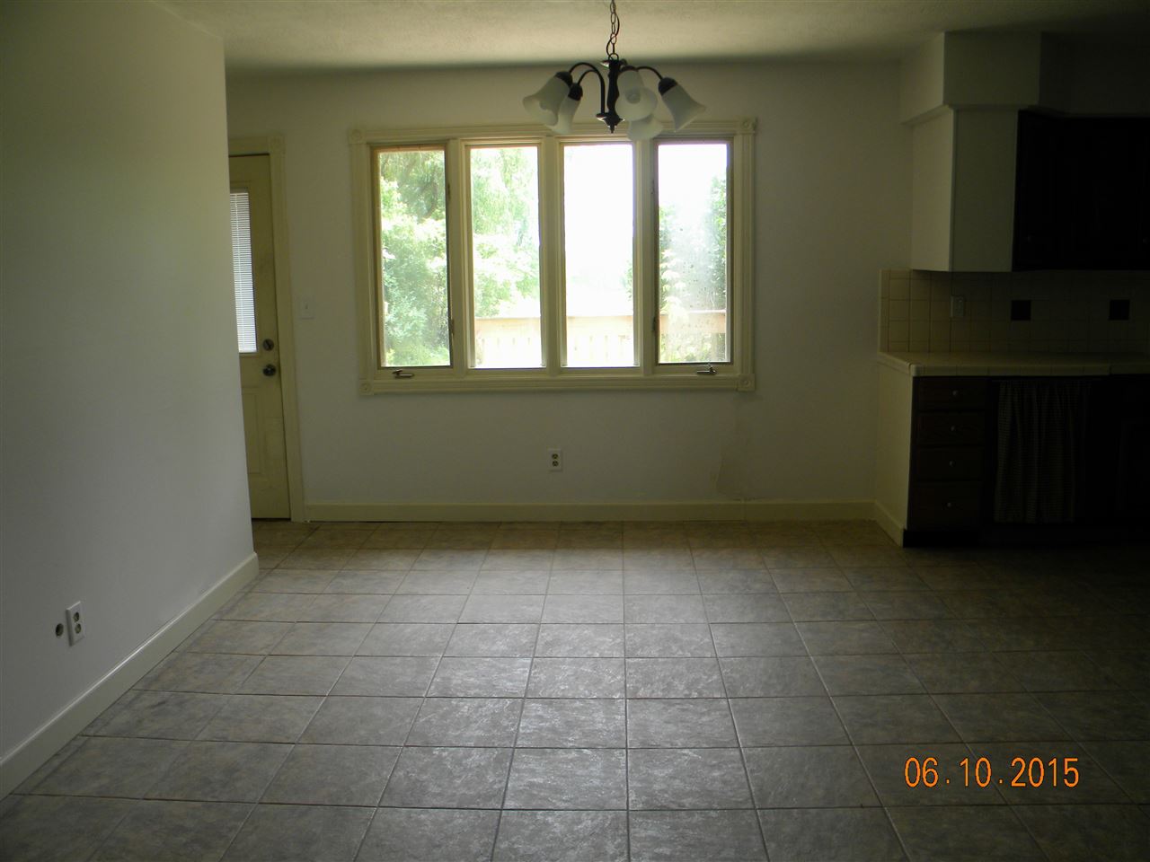 8105 Huber Road Belvidere, IL 61008 - Photo 9 of 20 a view of an empty room with a window