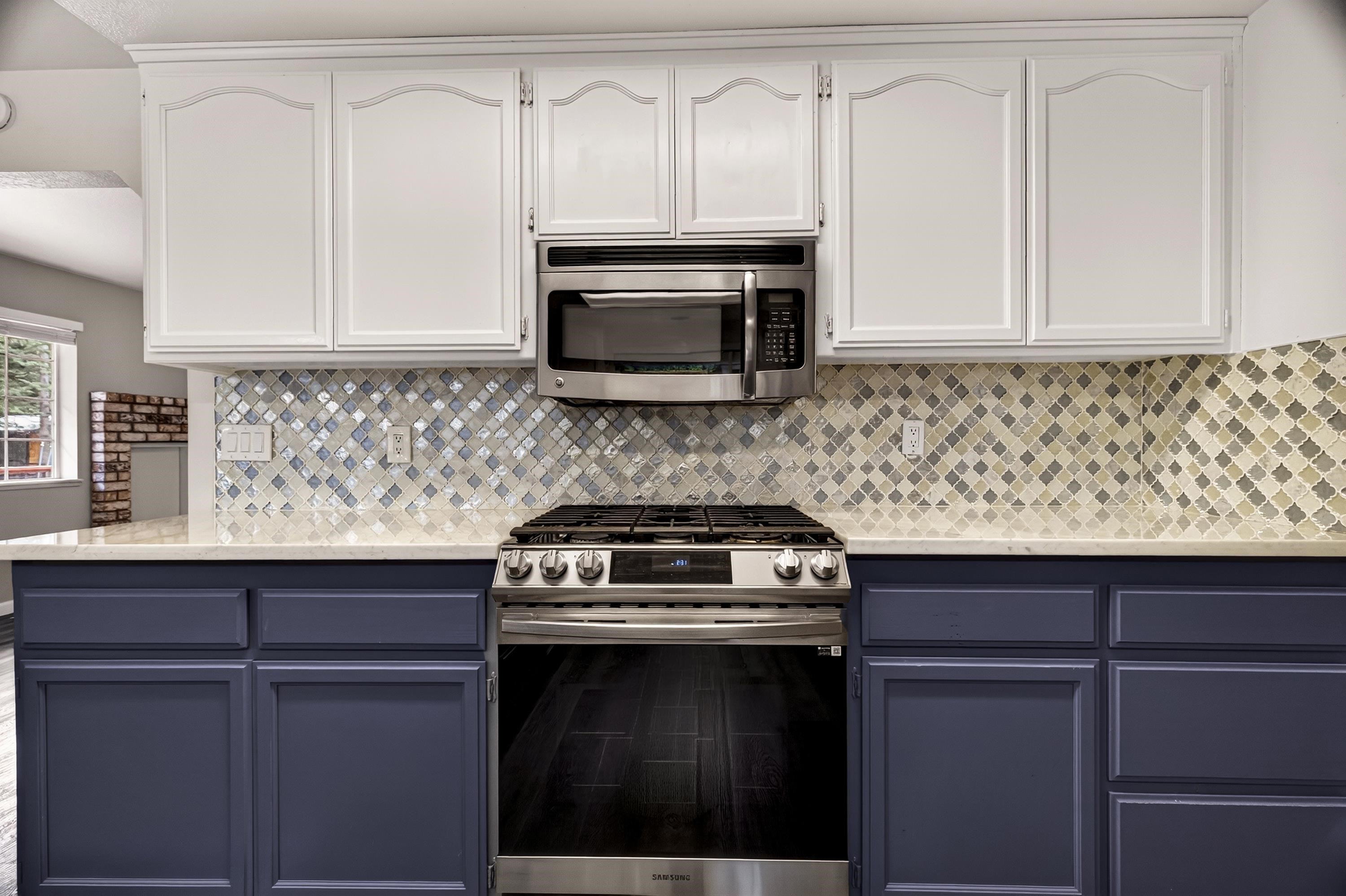 811 Golf Club Road Lake Almanor, CA 96137 - Photo 12 of 42 a kitchen with a stove and a microwave