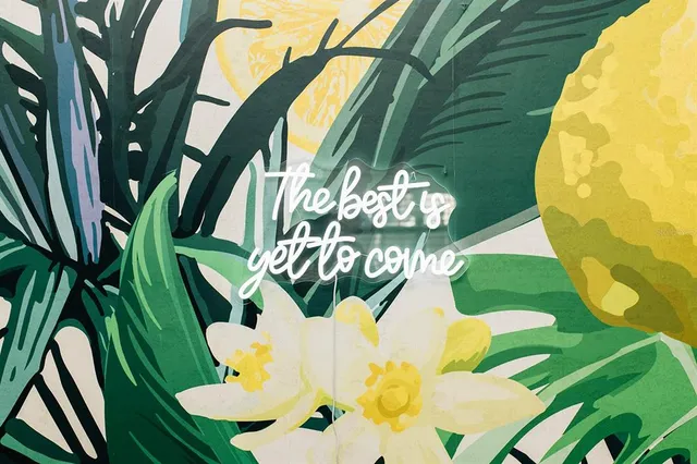 a vase of flowers sitting on a table