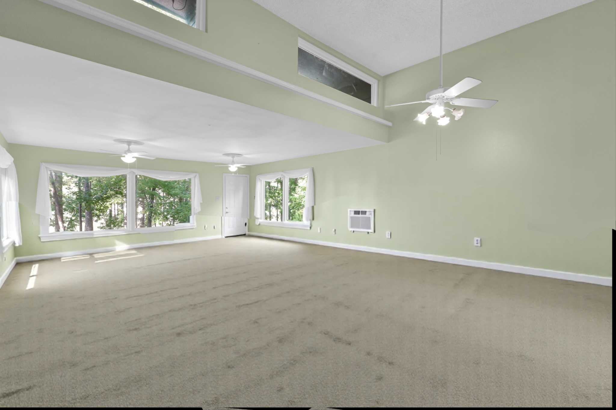 162 Villa Way Coldspring, TX 77331 - Photo 6 of 28 Extended Living/Dining room with panoramic windows
