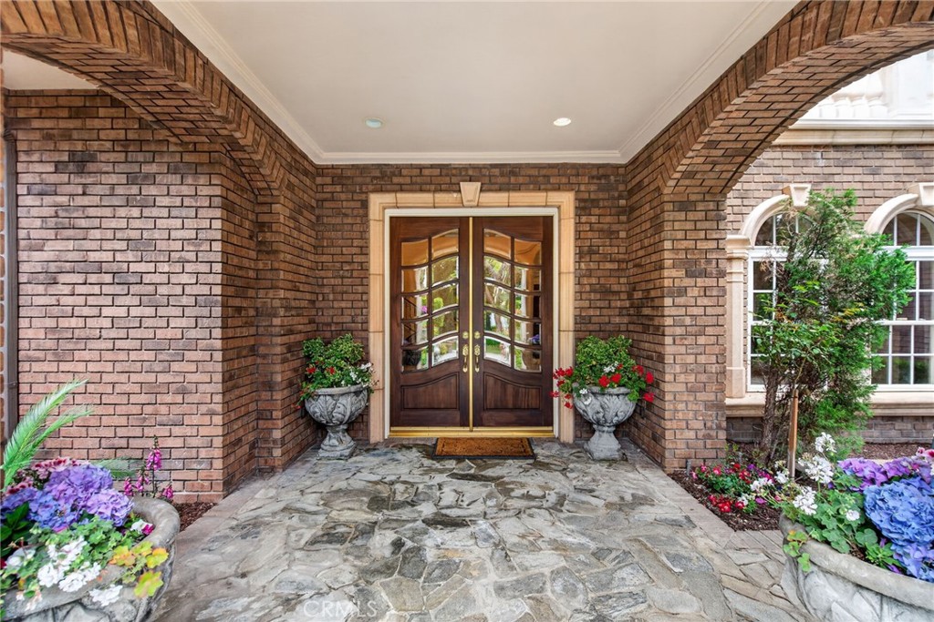 6952 Royal Hunt Ridge Drive Riverside, CA 92506 - Photo 13 of 75 a view of a entryway door of the house