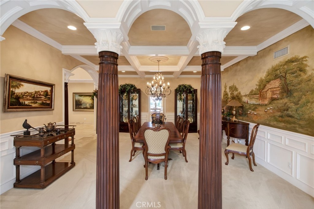 6952 Royal Hunt Ridge Drive Riverside, CA 92506 - Photo 20 of 75 a view of a hallway with living room and furniture