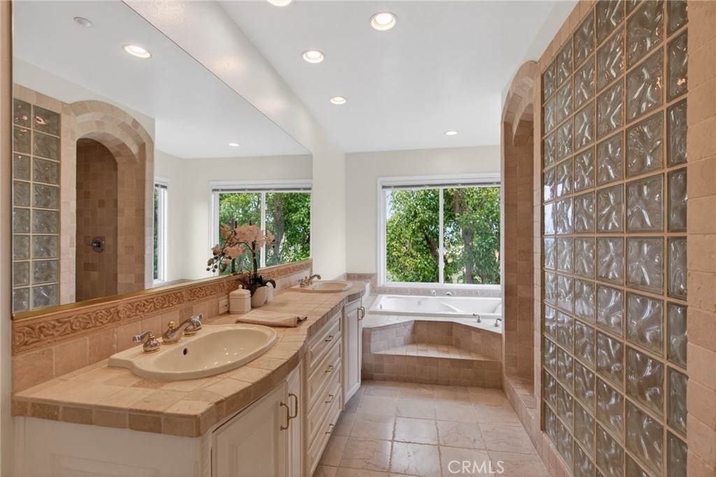6952 Royal Hunt Ridge Drive Riverside, CA 92506 - Photo 44 of 75 a bathroom with a sink and a bathtub