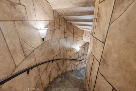 a bathroom with a sink toilet double vanity and shower