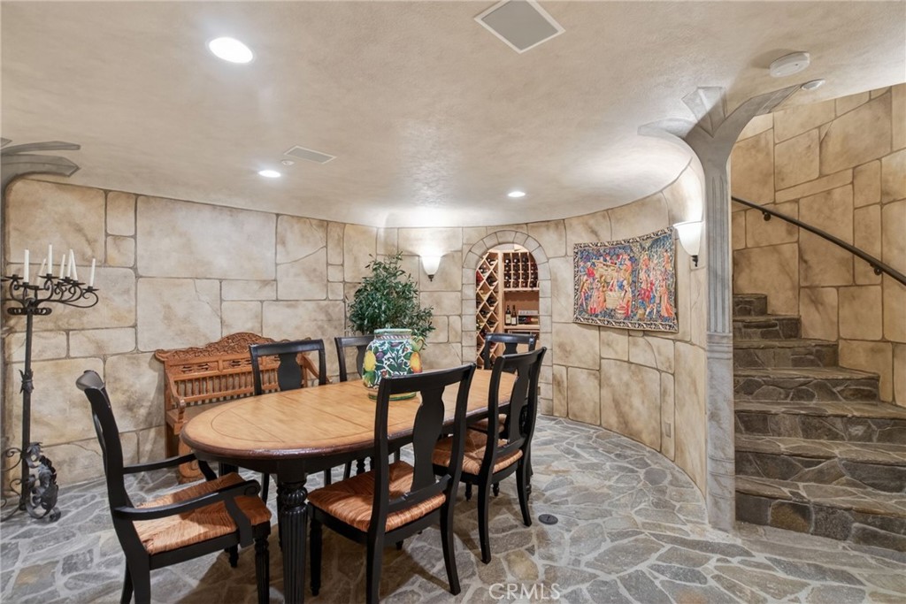 6952 Royal Hunt Ridge Drive Riverside, CA 92506 - Photo 50 of 75 a view of a dining room with furniture