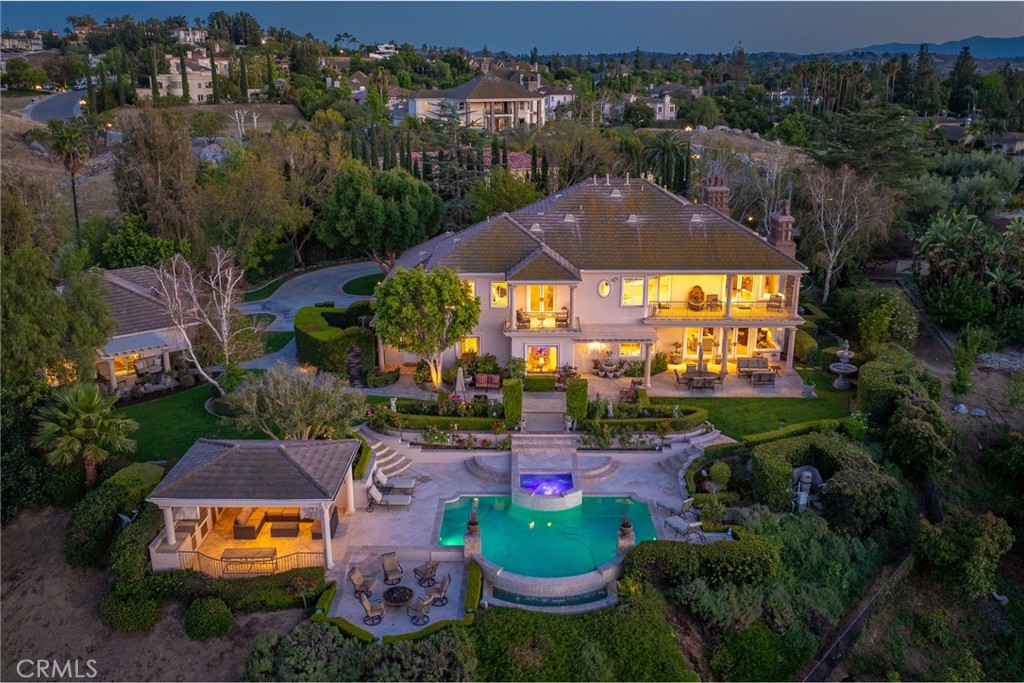 6952 Royal Hunt Ridge Drive Riverside, CA 92506 - Photo 6 of 75 an aerial view of house with swimming pool outdoor seating and yard