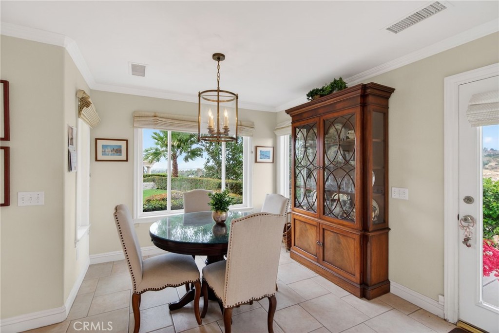6952 Royal Hunt Ridge Drive Riverside, CA 92506 - Photo 68 of 75 a view of a dining room with furniture window and outside view