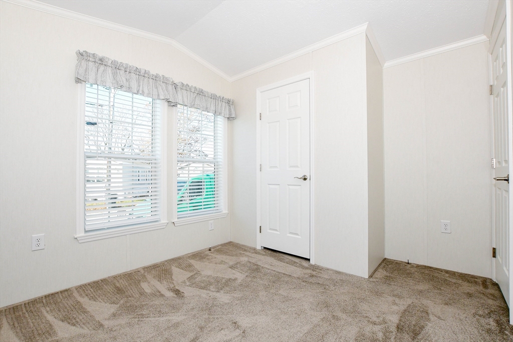 3040 Cranberry Highway, Unit 32 Wareham, MA 02538 - Photo 19 of 25 a view of an empty room with a window