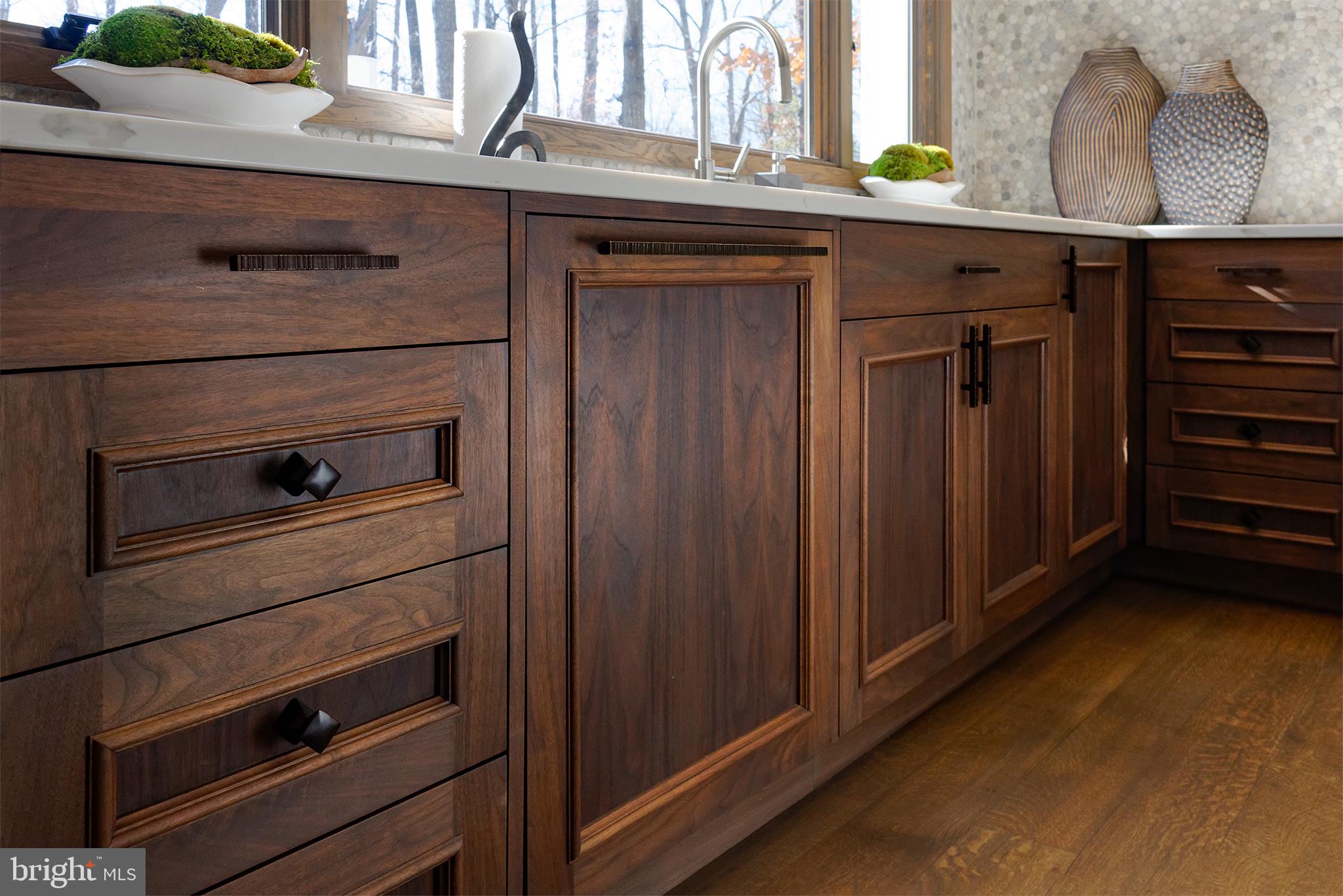Custom, solid walnut kitchen cabinets and drawers