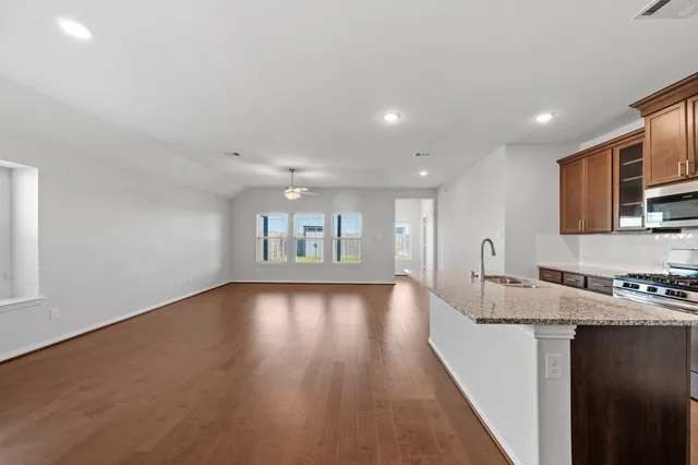 a view of a kitchen with a sink and dishwasher