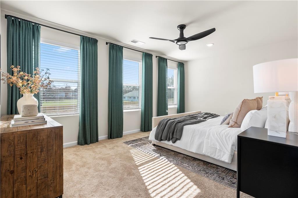 11535 Kimberly Court Hampton, GA 30228 - Photo 21 of 29 a bedroom with a bed and a window