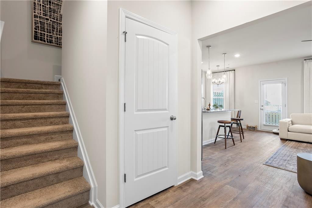 11535 Kimberly Court Hampton, GA 30228 - Photo 9 of 29 a view of a livingroom with furniture and stairs
