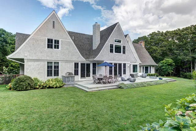 a front view of house with garden