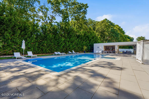 54 Georgetown Road Eatontown, NJ 07724 - Photo 16 of 24 a view of house with yard outdoor seating and entertaining space
