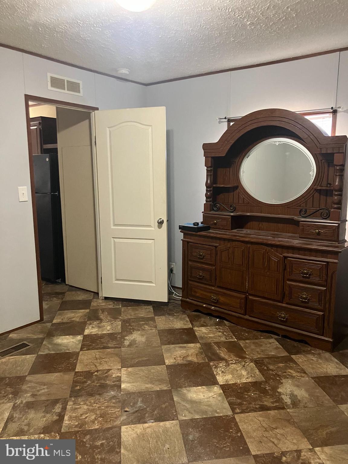 14201 Winchester Road Southwest Cumberland, MD 21502 - Photo 8 of 17 a bathroom with a mirror and a sink