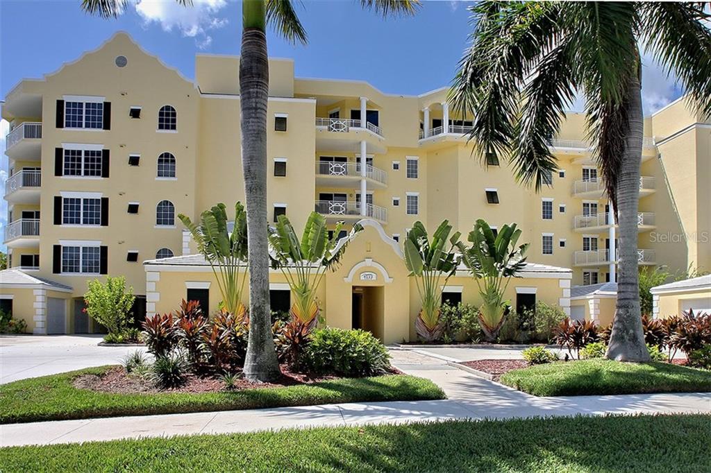 9122 Midnight Pass Road, Unit 52 Sarasota, FL 34242 - Photo 1 of 1 Somerset Cay front view from Midnight Pass Road