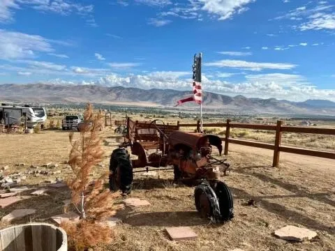 a view of a town with mountains in the background